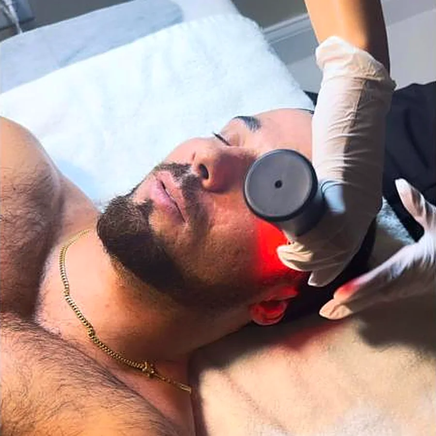 LED light therapy on a client